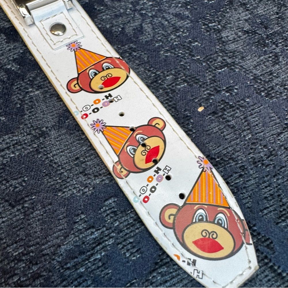 White character monkey Watch - White and Orange needs battery
